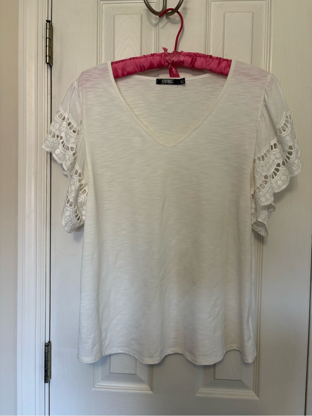 White V-Neck top with Flutter Cut-out sleeves